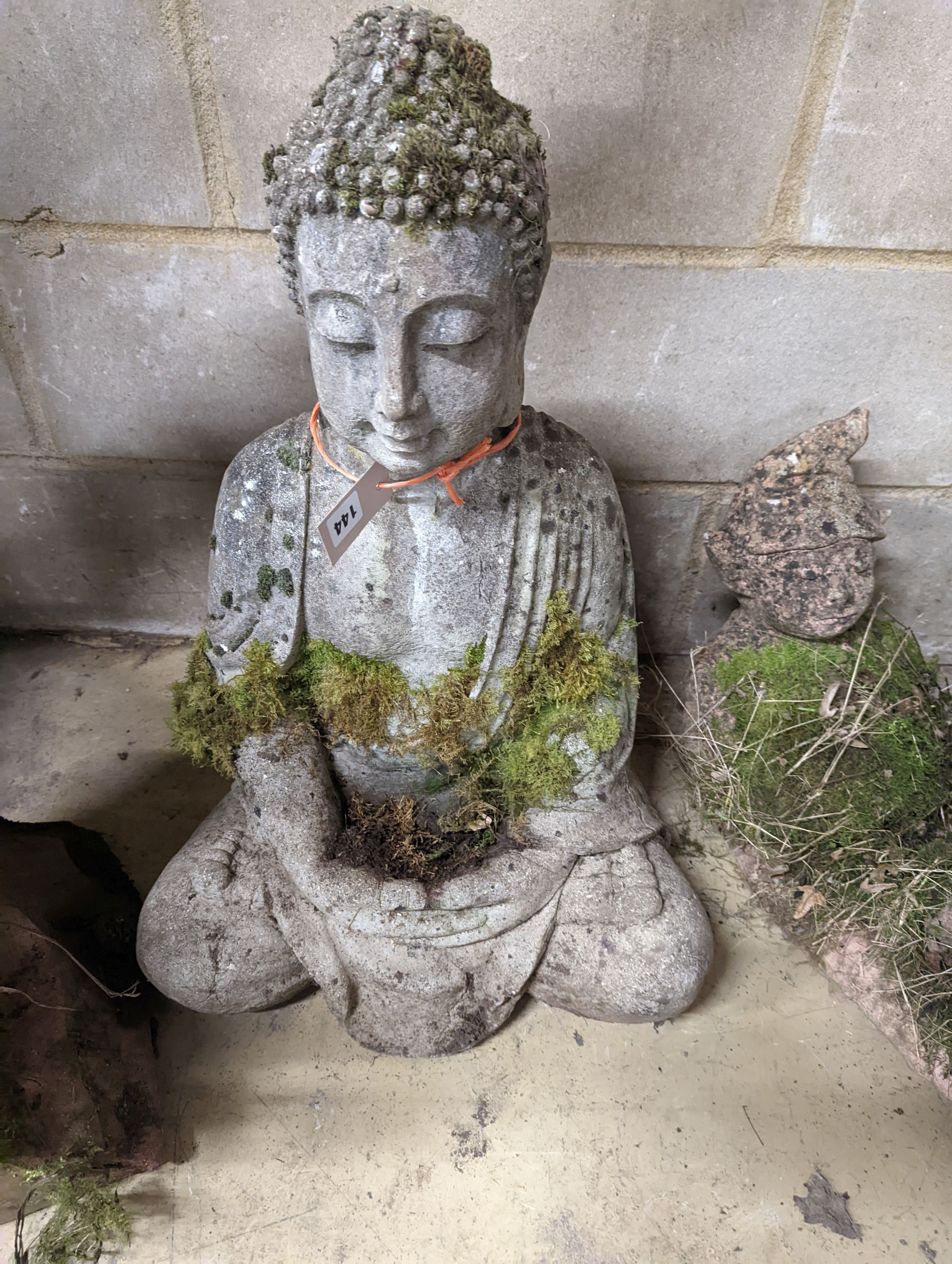 A reconstituted stone seated Buddha bird bath, height 64cm